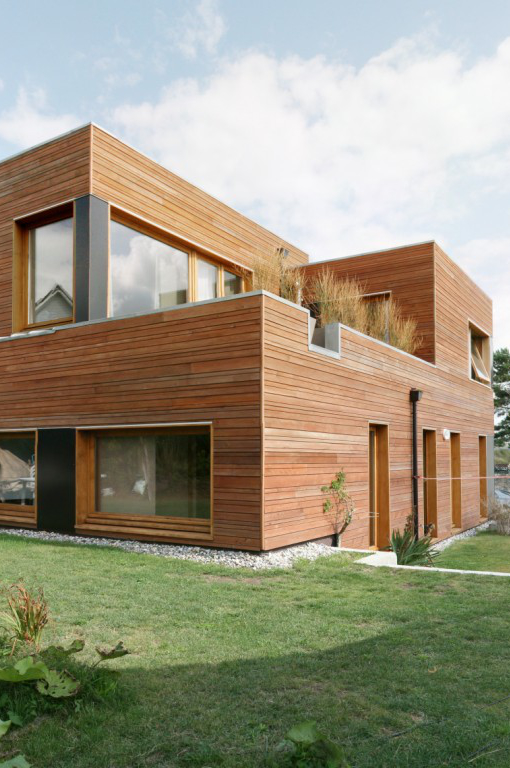 Maison ossature bois à toit plat. Maison toit terrasse.